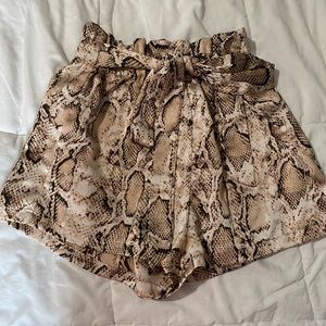 Snake skin paper bag shorts.